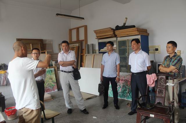 山东省美术馆副馆长、著名画家王建国一行应邀来bw必威阿森纳参观交流